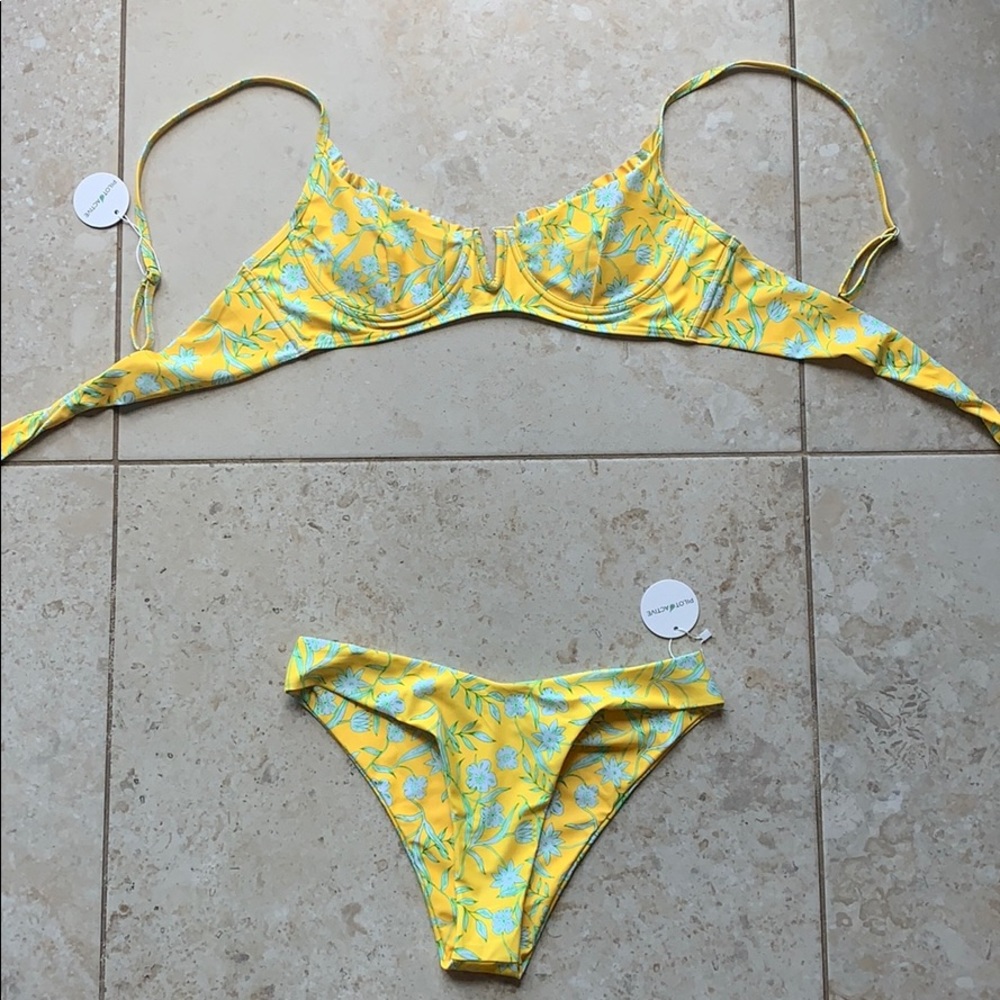 A yellow, flower pattern bikini!
